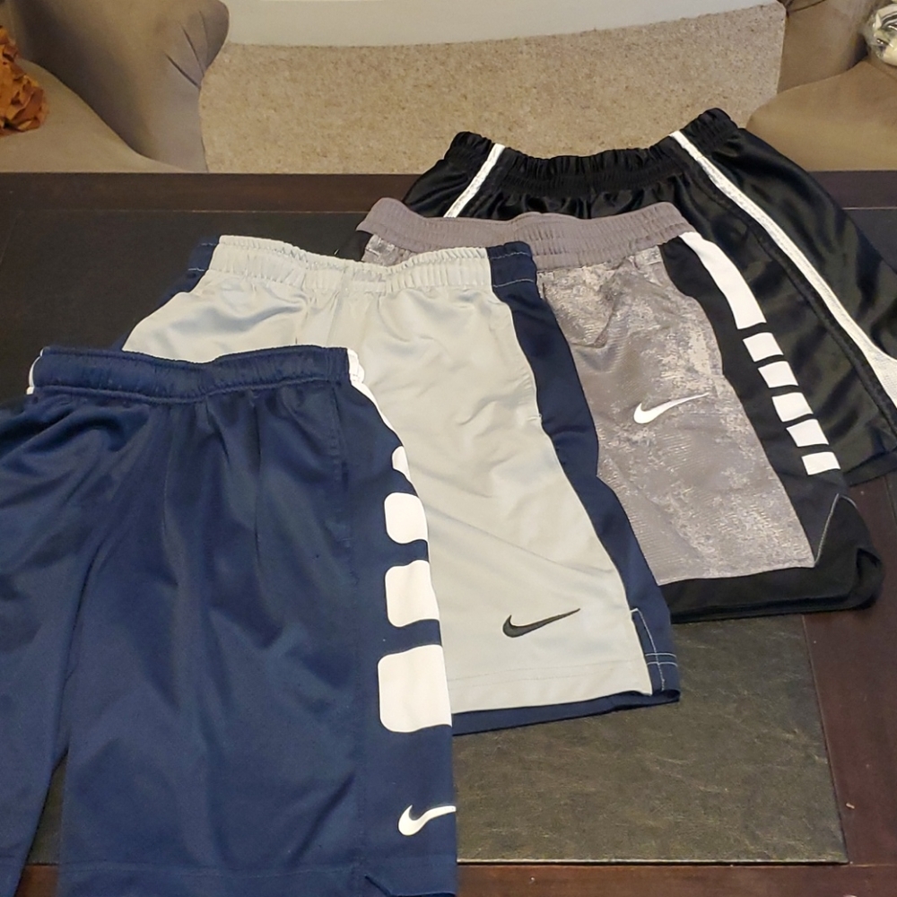 Nike lot of 4 boys shorts (one small, 3 medium)